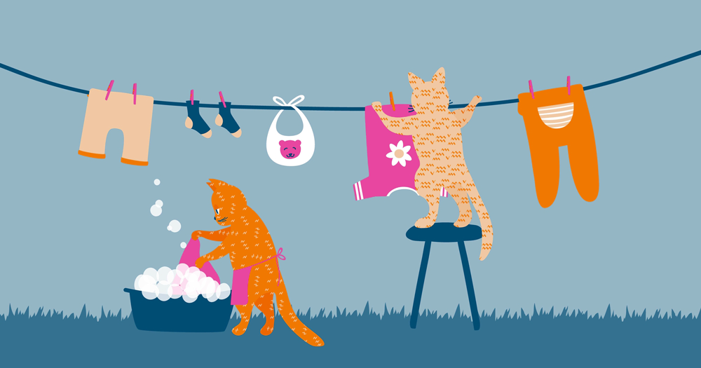 cartoon of two cats hanging clean clothes to avoid laundry overwhelm
